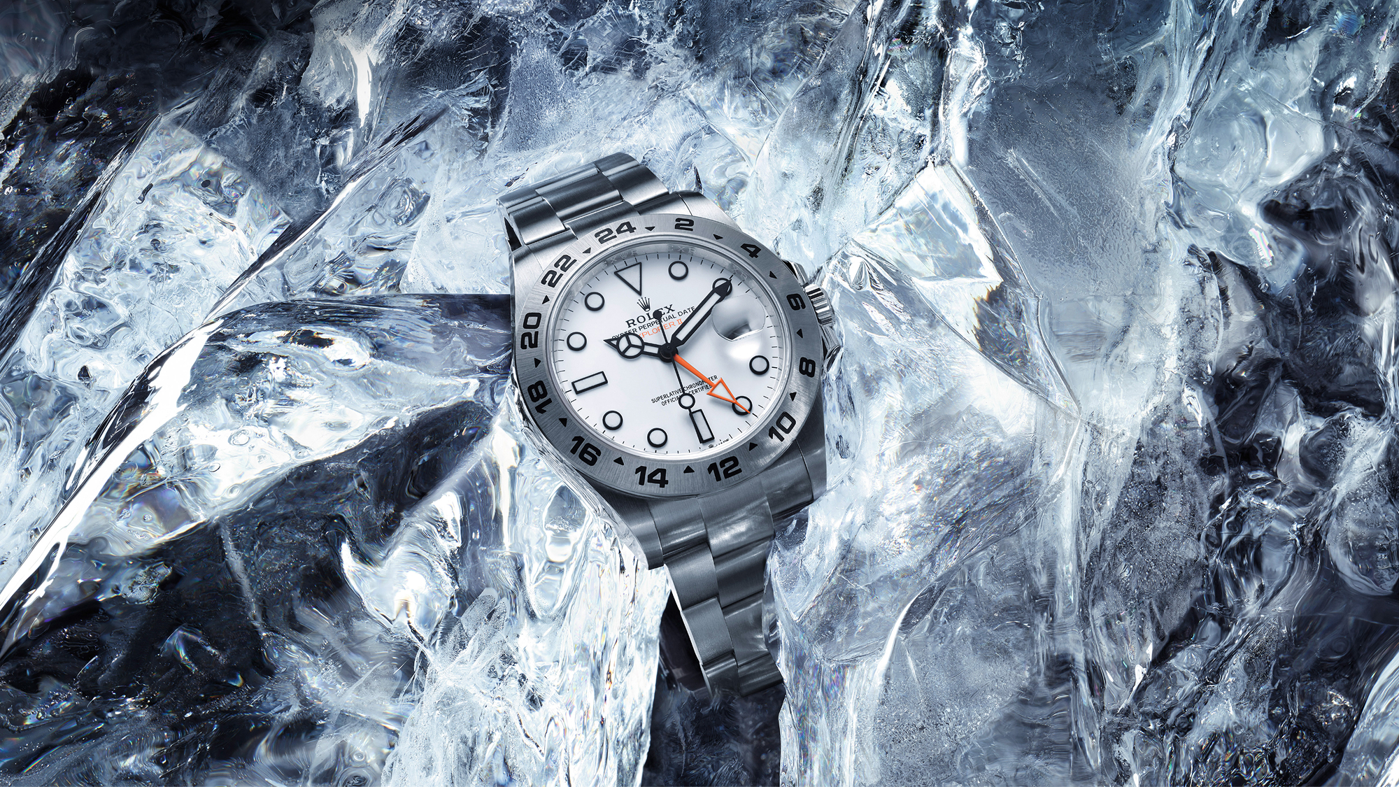 Rolex Explorer II in Oystersteel with white dial embedded in fractured ice crystals