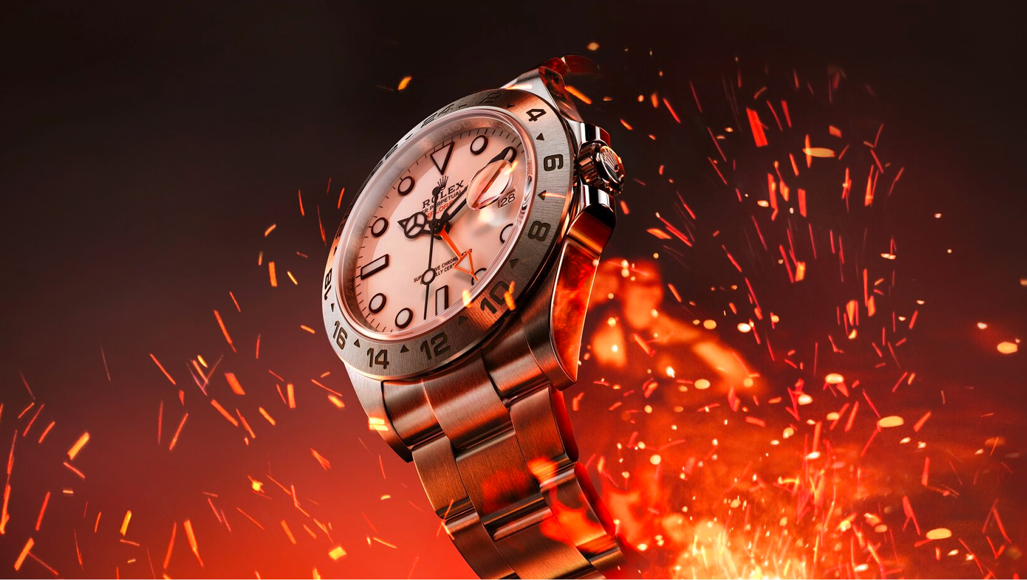 Rolex Explorer II in Oystersteel with white dial surrounded by volcanic embers and fire sparks