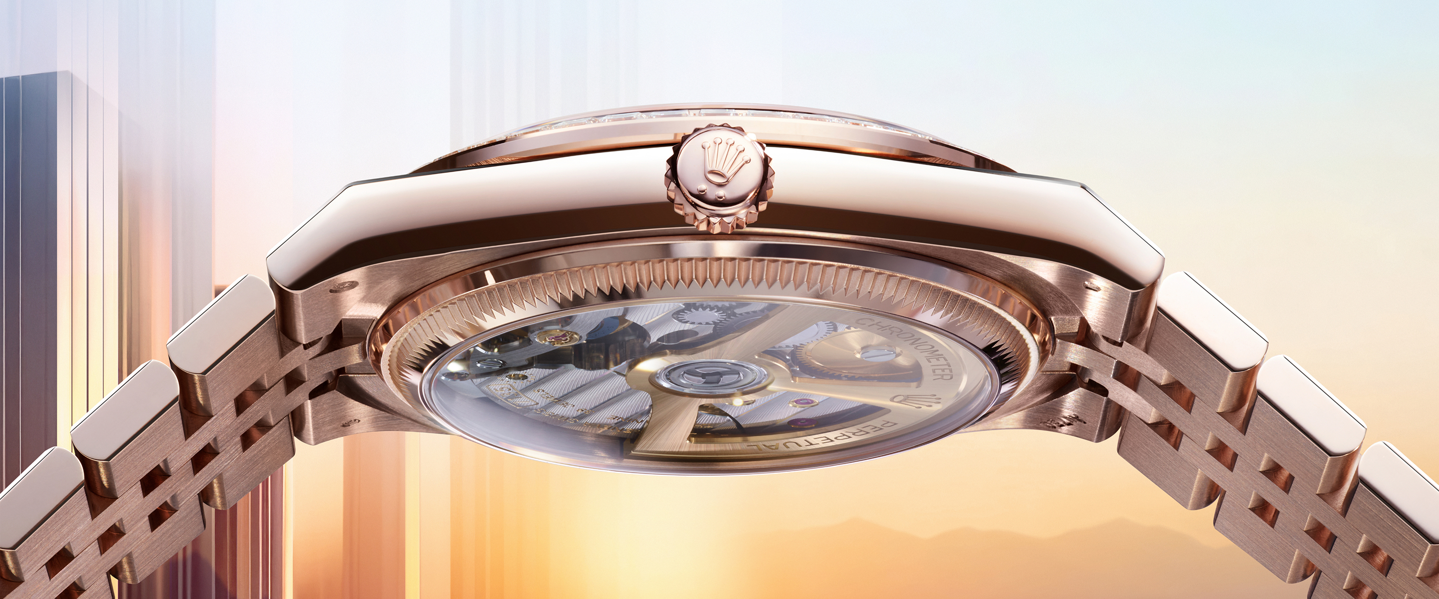 Rolex Land-Dweller caliber 7135 movement visible through the transparent caseback, featuring the cut-out oscillating weight in yellow gold