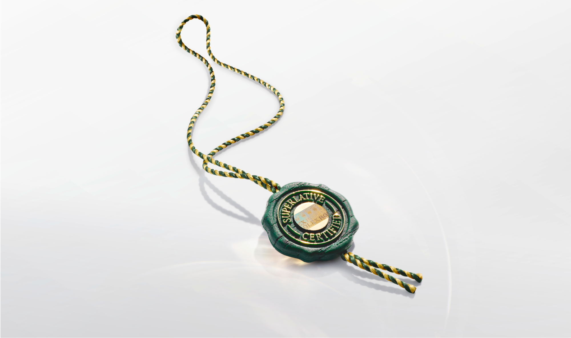Rolex Superlative Chronometer certification green wax seal with gold and green cord
