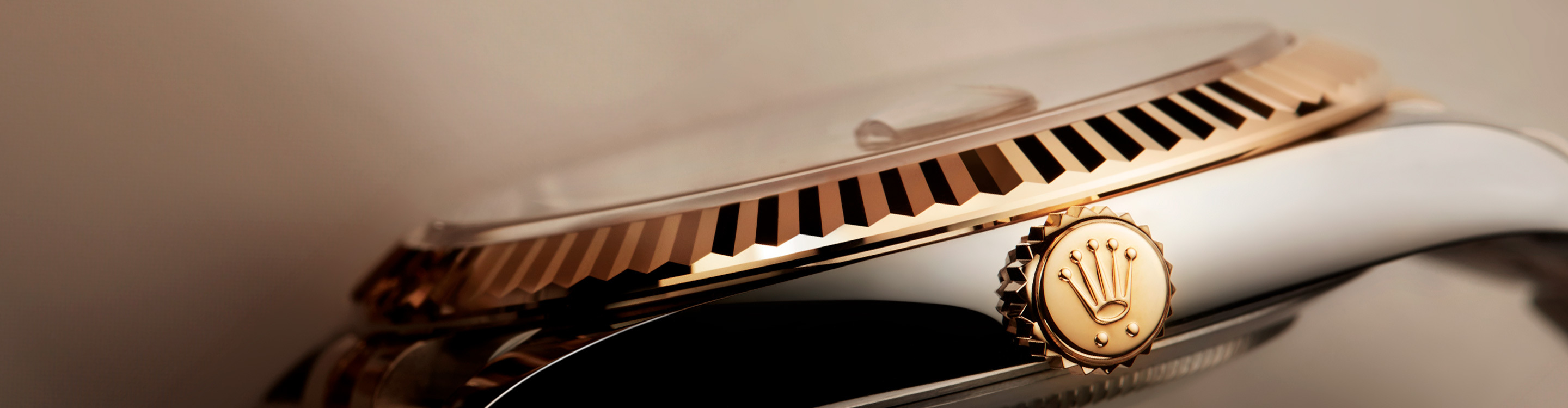 Side profile of gold Rolex watch