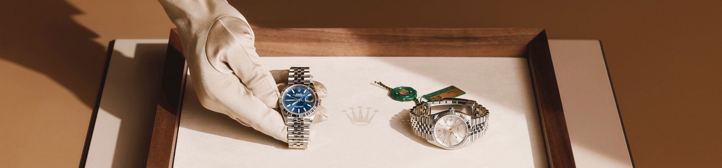 Rolex watch with leather strap facing the front